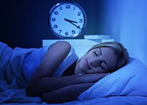 woman in her bed in deep sleep