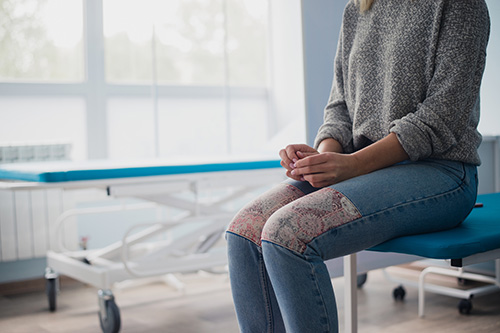 A woman in the doctor's office for her pap smear