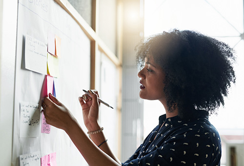 A woman learning more about her menstrual cycle