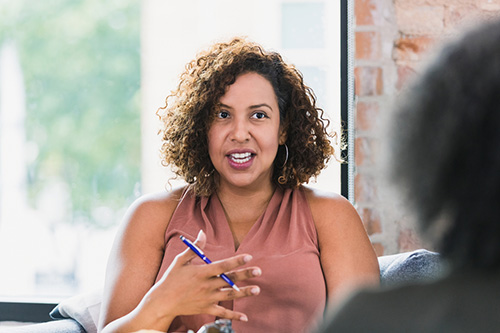 Woman asking questions about hormones and hormone replacement therapy