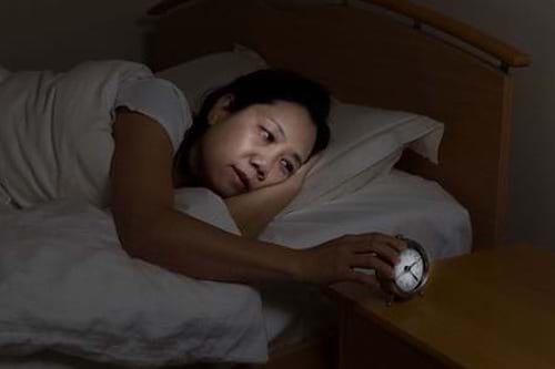 A woman with insomnia caused by an underlying hormonal imbalance