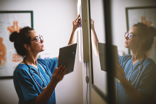 Doctor Is Prepping For Her Patient