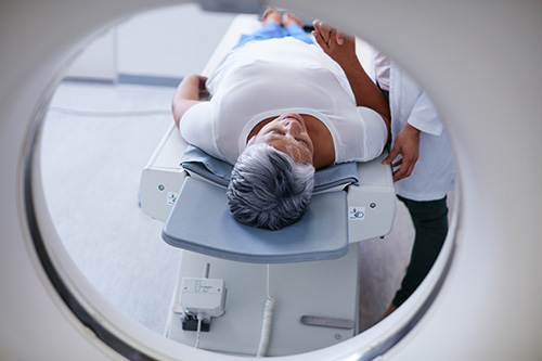 Woman getting MRI guided uterine ablation