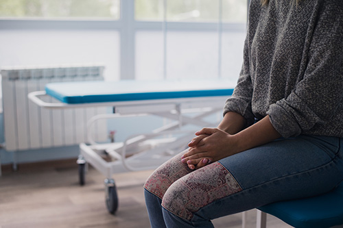 A woman is prepping for laparoscopic surgery