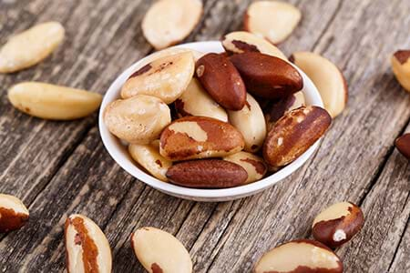 brazil nuts on wooden table 