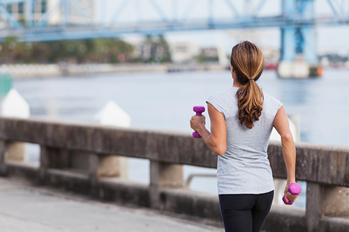 A woman walking to improve her health