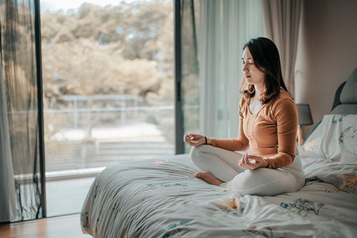 Woman learning to meditate