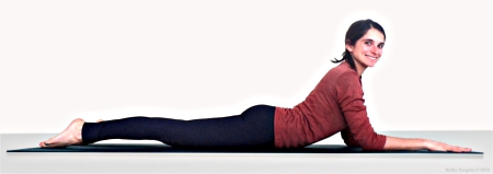 Woman in Sphinx (Salamba Bhujangasana) Pose