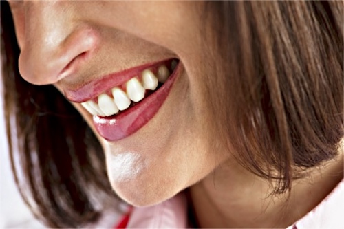 Gum disease, marked by bleeding and irritated gums, can be a symptom of hormonal imbalance