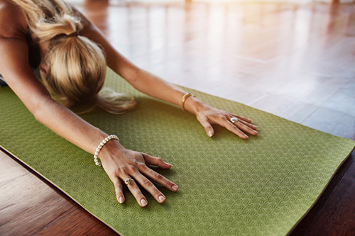 A woman at her first yoga class