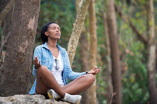 A woman interested in learning more about the chakras