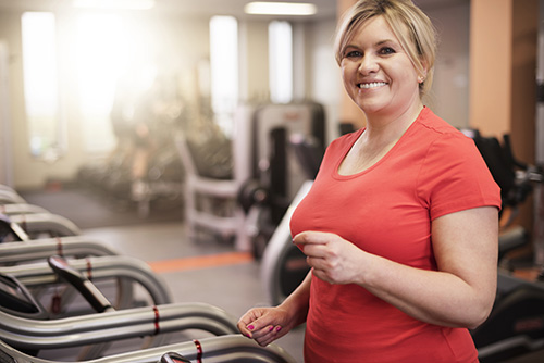 A woman taking steps to reverse fatty liver