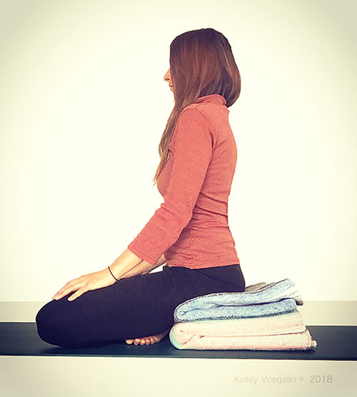 woman with good posture while meditating