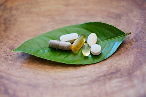 A grouping of natural vitamins and supplements for women
