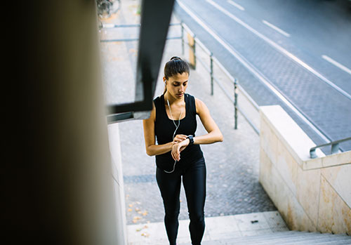 a woman can use music or a metronome to keep a steadier walking pace