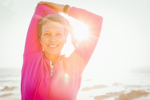 A woman taking vitamin D for her health