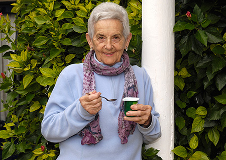 Woman eating yogurt