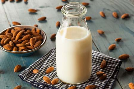 Almond milk has added vitamins and is low in calories. almond milk has added vitamins and is low in calories