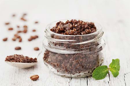 A body scrub with ground coffee, brown sugar and coconut oil to reduce appearance of cellulite. a body scrub with ground coffee, brown sugar and coconut oil to reduce appearance of cellulite