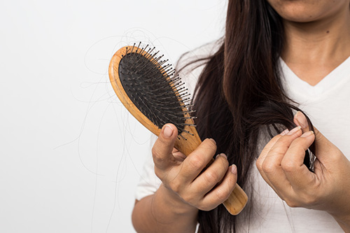 Hair Loss Symptoms in Men and Women - Buckhead Hair Restoration