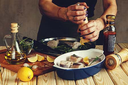 woman cooking low-glycemic meal