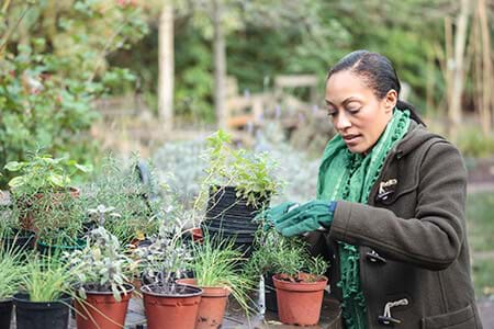 woman in menopause working in urban garden