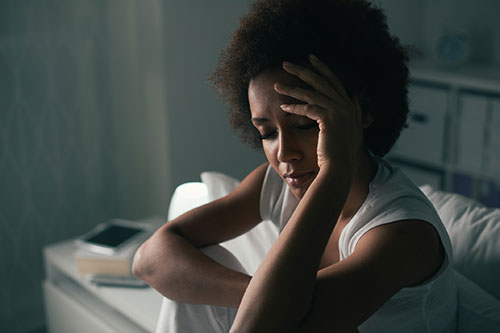 women with crashing fatigue in menopause have symptoms like anxiety, frequent hunger and fuzzy thinking