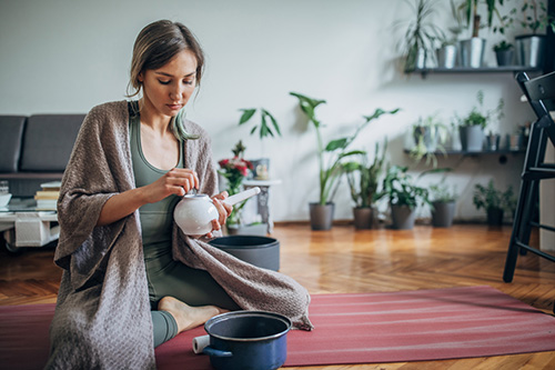 Woman using neti pot