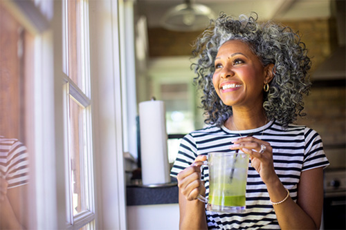 busy woman practicing 1-minute self-care tips