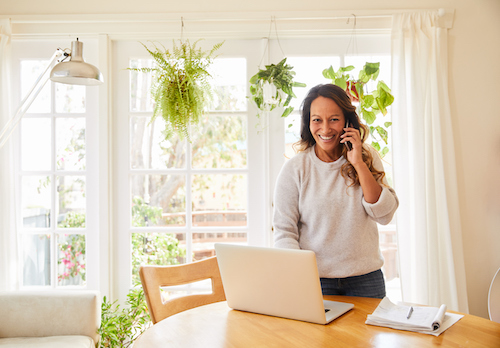 Woman on the phone talking about bone loss during menopause