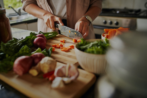 Woman Chopping Vegetables