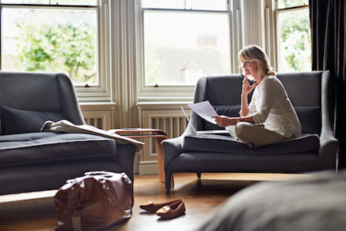 woman reading her laptop