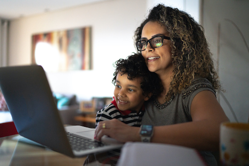 A woman looks up information about immune health on her computer