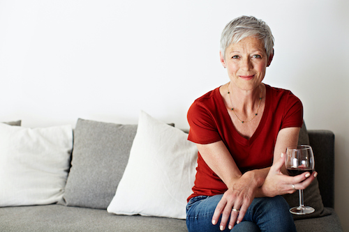 Smiling Mature Woman Drinking Wine