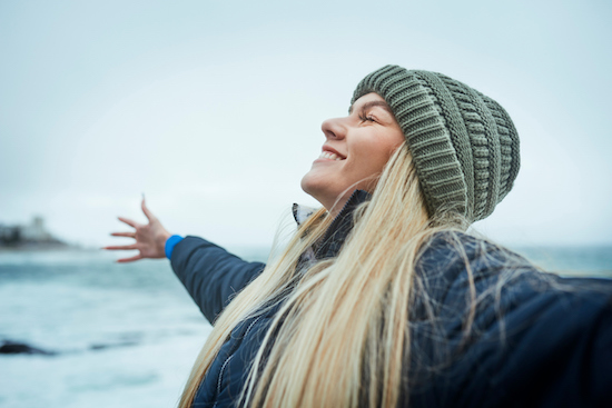 Woman, Success And Freedom By Beach, Ocean Or Sea In Canada With Climate Change Goals, Sustainability Target And Environment Mindset. Happy Smile, Nature Volunteer And Marine Biologist By Water Waves